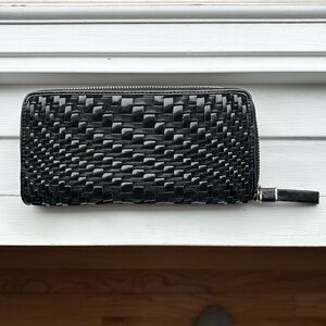 Cole Haan woven leather zip around wallet.
